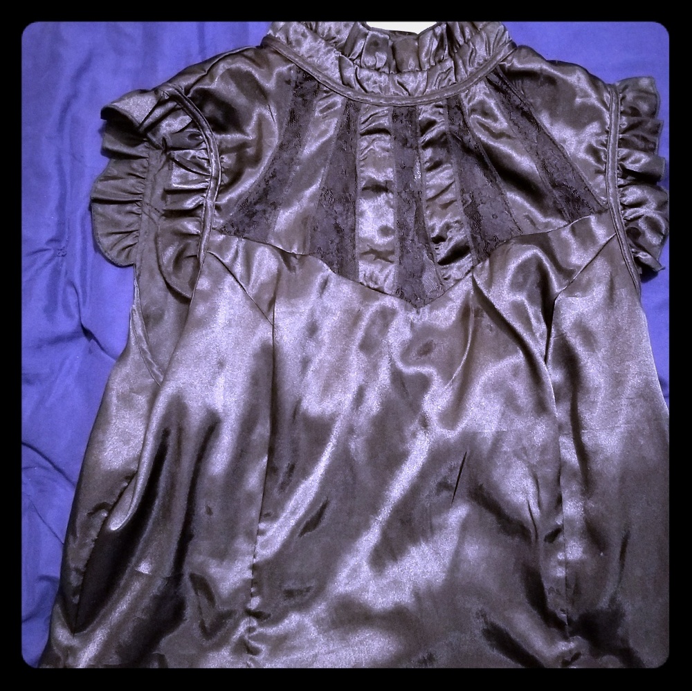 Ruffled sleeveless Blouse